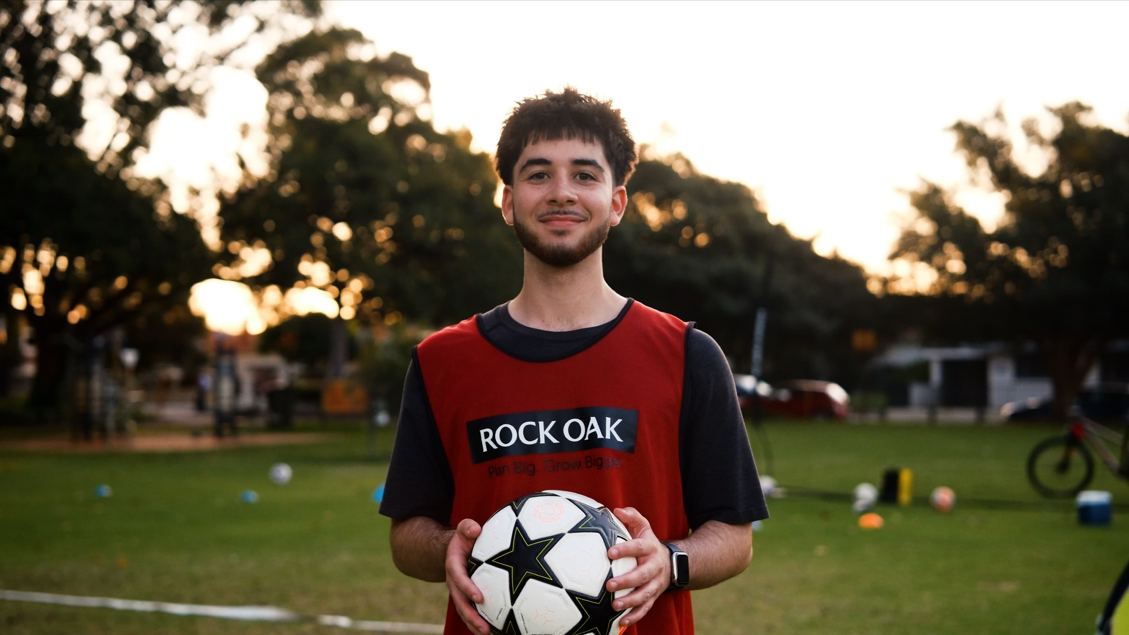 Female athlete in plank position on an outdoor track